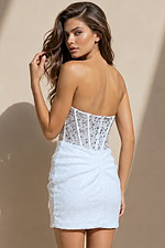 back view of ivory bodycon mini dress with strapless sweetheart neckline, beaded corset bodice, and ruched sequin skirt