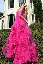 Elegant strapless gown with sheer overlay and voluminous floral details