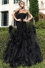 Sheer tulle gown with strapless bodice and floral appliqués