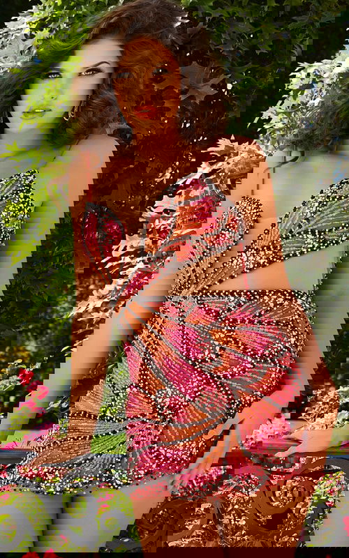 Model wearing Jovani 40130 mini dress with beadwork and cut-out detail, front view.