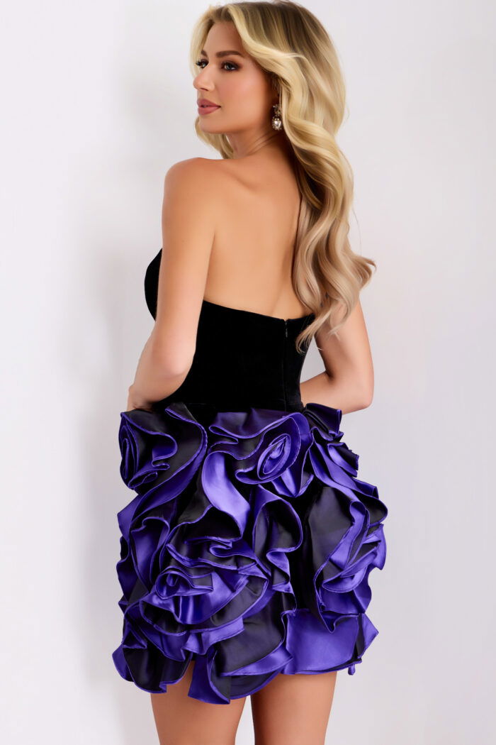 Back of mini dress showing zipper and layered rosette detail
