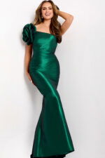 Shiny green evening gown with dramatic shoulder embellishment