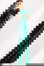 Back view of fitted green formal gown with rosette sleeves