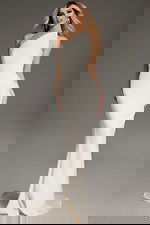 Model wearing Jovani 40301 ivory one-shoulder evening gown, front view.