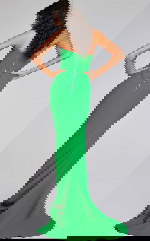 Model wearing Jovani 40301 green gown showing the back view.