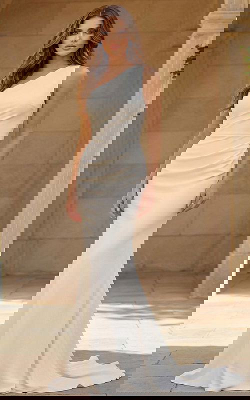 One shoulder fitted bridal gown with smooth fabric and clean silhouette