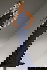 Model wearing Jovani 40301 navy one-shoulder evening gown, front view.