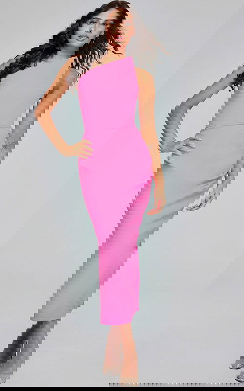 Model in Jovani 40302 pink dress, showing the elegant side view with a subtle slit.