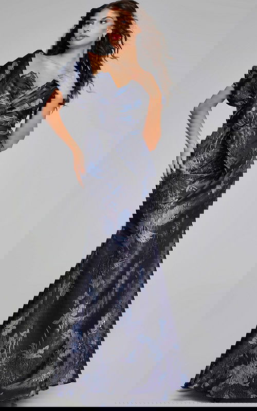 Model wearing Jovani 40309 elegant mermaid gray gown from front view, showcasing strapless sweetheart neckline and floral detailing.