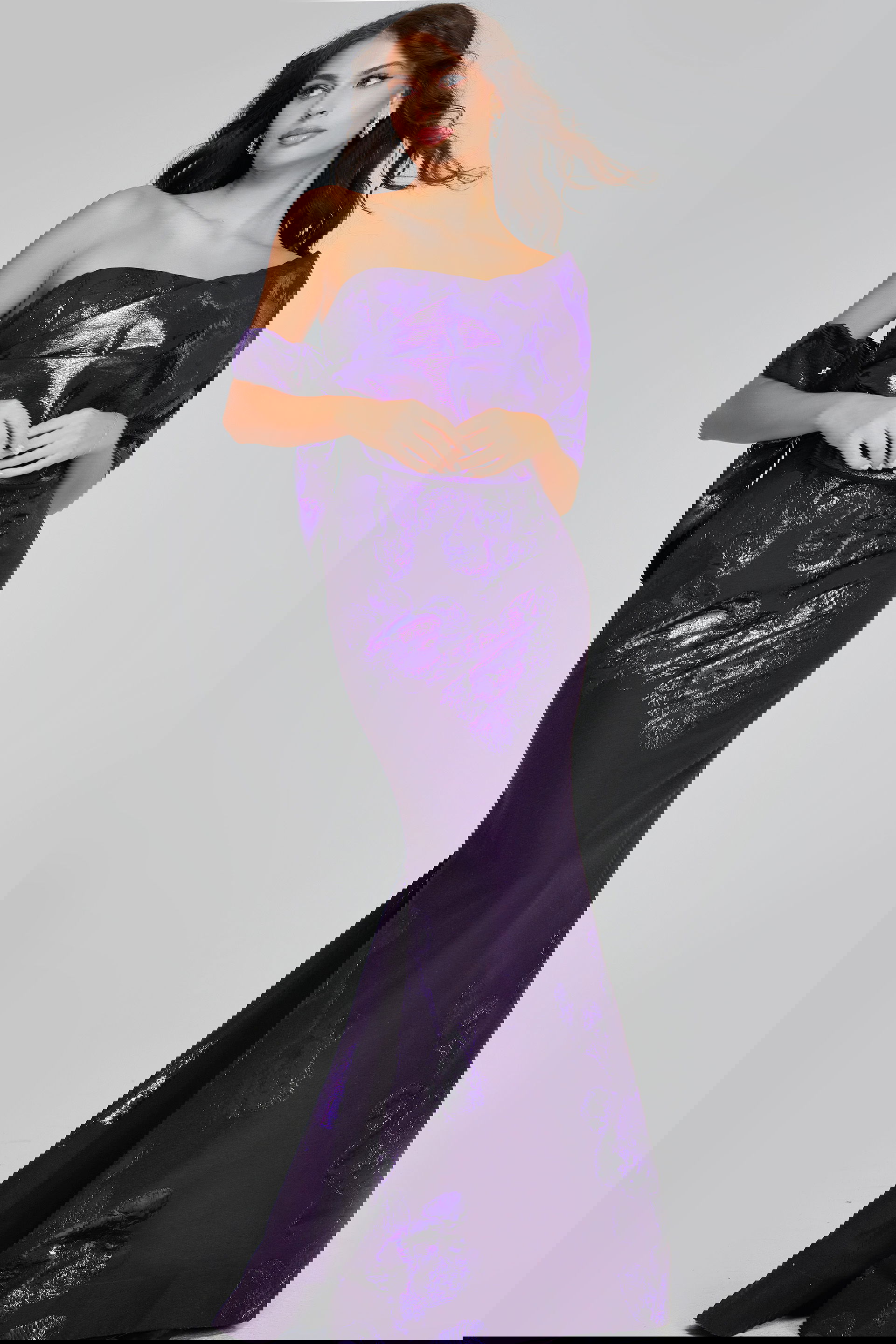 40318-PURPLE-2013.jpg Model wearing Jovani 40318 back view, showing intricate dress details in purple.