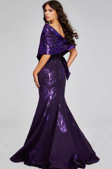 Model wearing Jovani 40318 in purple, displaying back design.