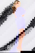 Back view of indigo dress with dramatic silhouette