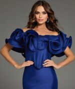Front view of model in Jovani 40324 purple mermaid gown with ruffles