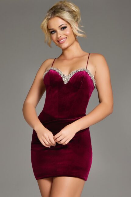 Model showcasing Jovani 40360 burgundy dress with embellishments.