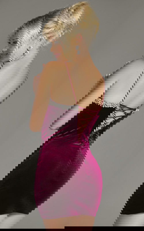 Back view of model wearing Jovani 40360 dress with crisscross detailing.