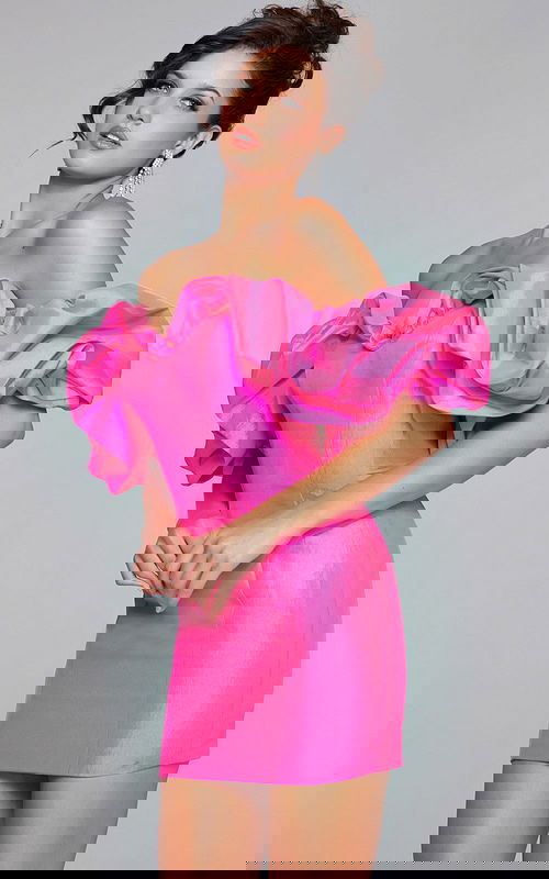 Model wearing Jovani 40378 vibrant pink dress, side view.