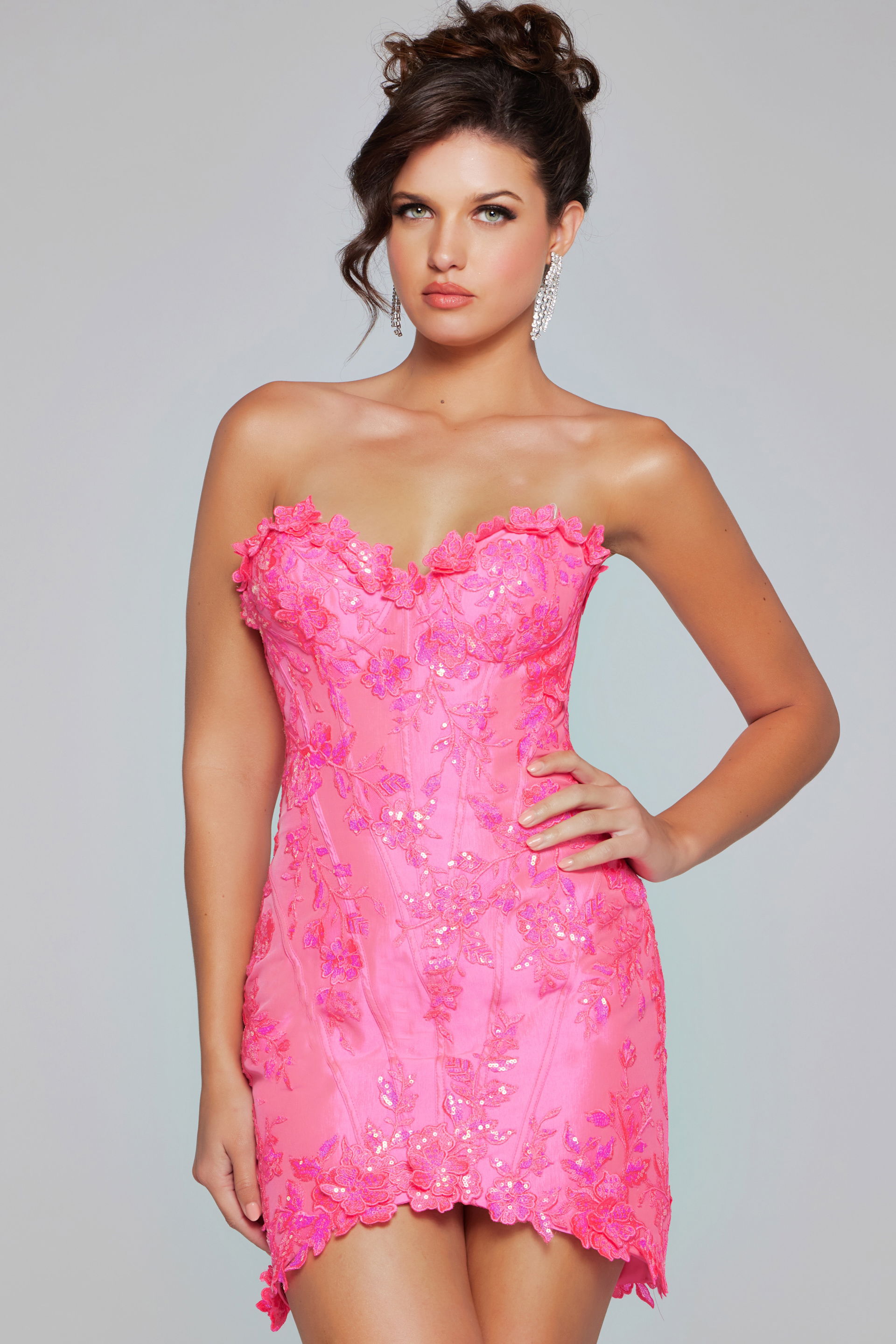 40380-203.jpg Model wearing Jovani 40380 pink mini dress with floral embroidery, front view.