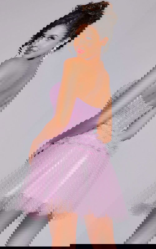 Model wearing Jovani 40467 lilac dress with sweetheart neckline displaying the back