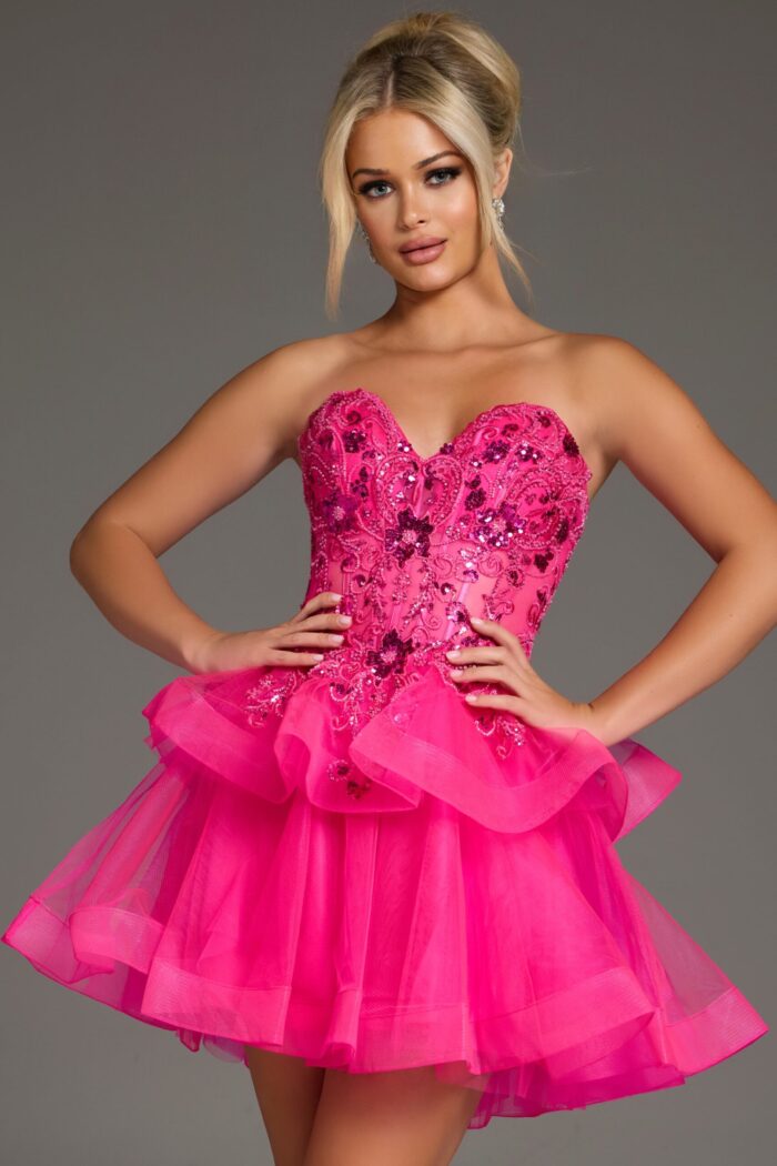 Model wearing Jovani 40503 pink dress with sweetheart neckline and layered skirt.