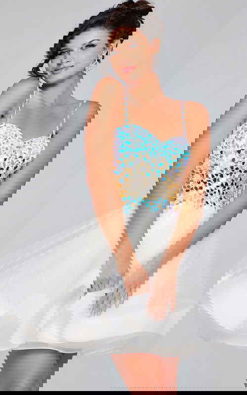 Model wearing Jovani 40516 ivory dress, front view, showcasing A-line silhouette and embellished bodice.