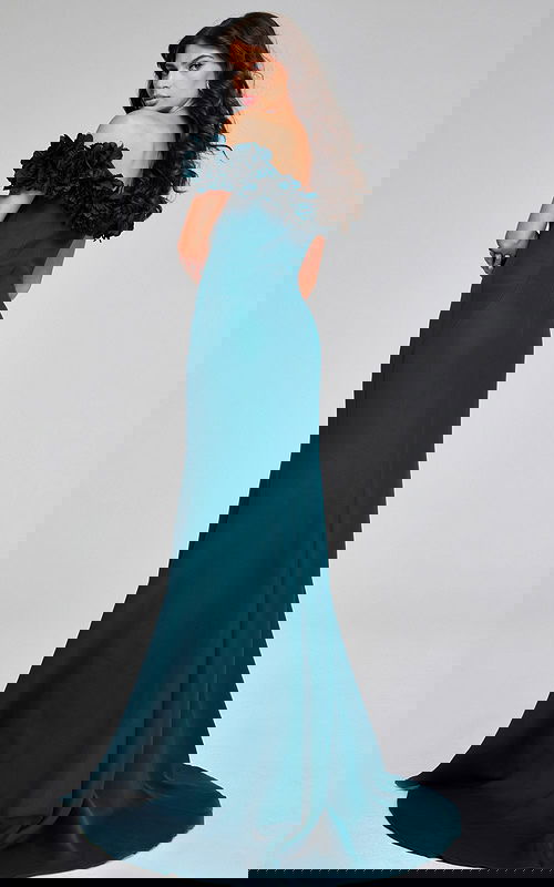 model displaying the back of Jovani 40595 emerald gown with elegant floral details