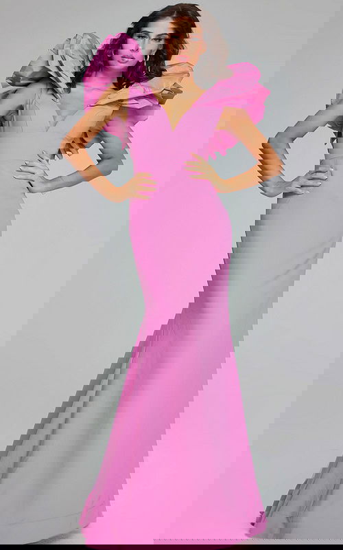 Model wearing Jovani 40663 pink mermaid dress with V-neckline and ruffled sleeves, front view