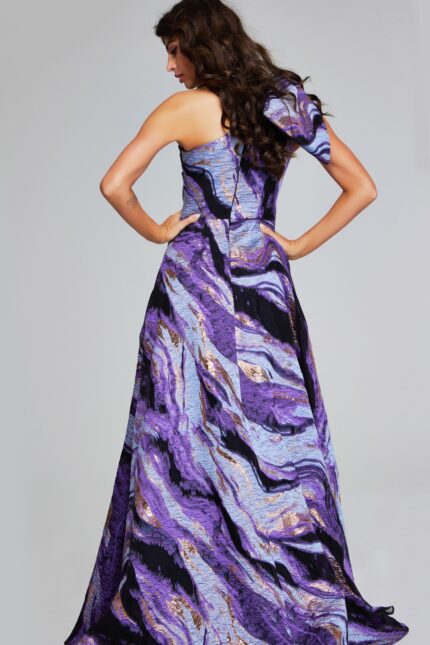model wearing Jovani 40695 purple gown, back view highlighting flowing skirt