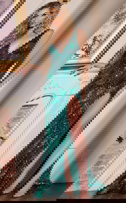 Model wearing Jovani 40757 green sequined dress, front view with deep V-neckline and thigh-high slit.