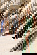 Elegant sequin gowns with deep V-necklines and high slits in multiple colors