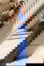 Deep V-neck sequin gown with floral pattern and side slit