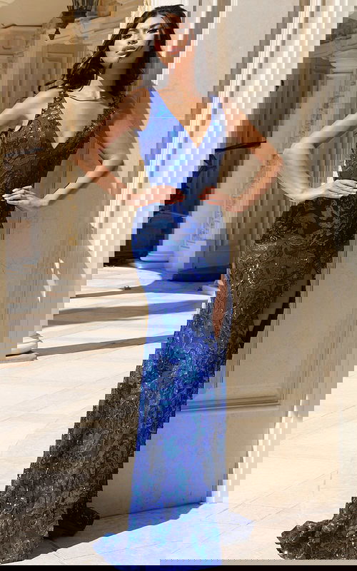 Deep V-neck sequin gown with floral pattern and side slit