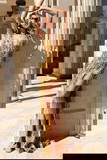 Elegant fitted evening dress featuring shimmering red sequins