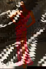 Glamorous formal dress with bold floral sequins and slit design