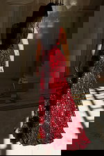 Deep V-neck sequin gown with floral beading and high slit