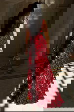 Deep V-neck sequin gown with floral beading and high slit