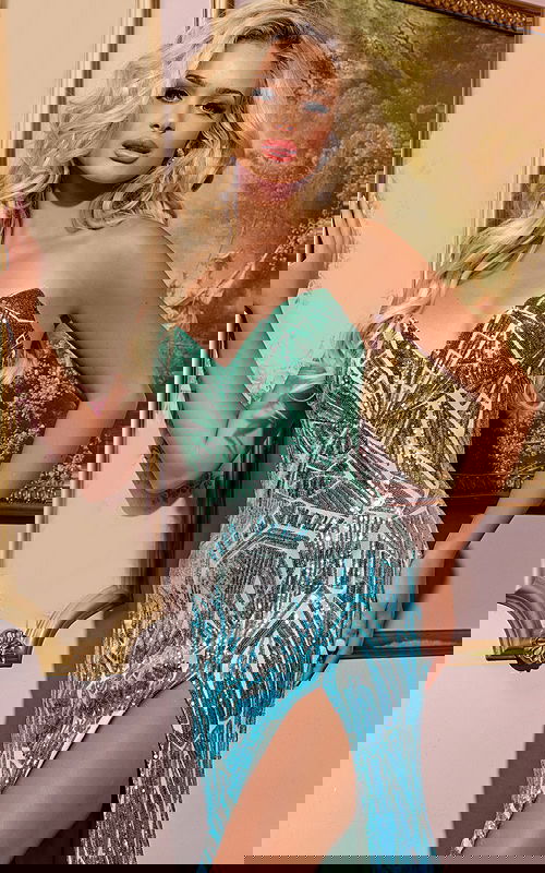 Model wearing Jovani 40763 dress with sweetheart neckline and high slit in blue, front view.