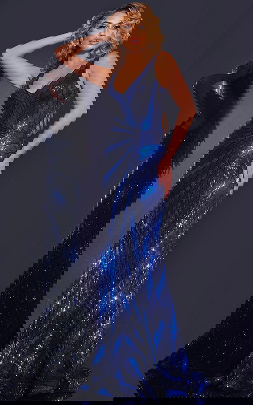 Model wearing Jovani 40766 navy dress with a shimmering sequined design.