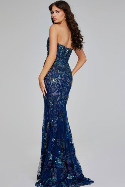 Model wearing Jovani 40847 navy strapless mermaid silhouette dress with lace and sequins, back view.
