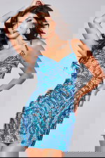 Model wearing Jovani 40916 blue mini dress with sequin details, front pose