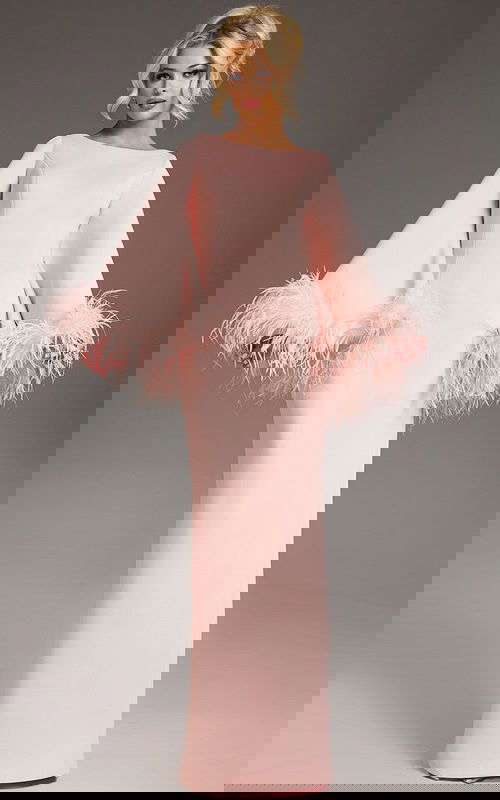 Model wearing Jovani 41077 blush gown with bell sleeves and feather accents from the front.