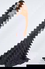 Side view of strapless mermaid gown with structured silhouette and flowing train