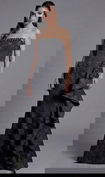 strapless black evening dress featuring sculpted ruffle detail and fitted silhouette