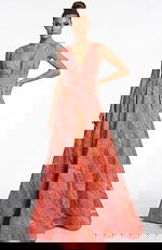 textured A line gown with deep V neckline and draped bow detail