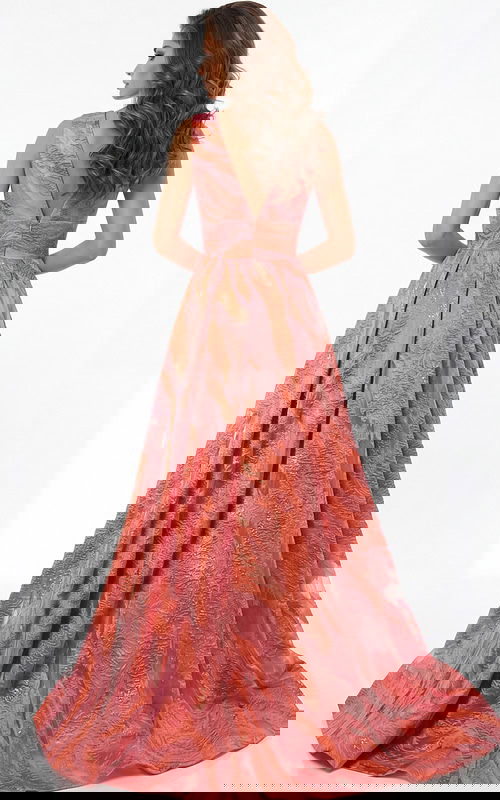 A line gown with open V back and flowing floor length skirt