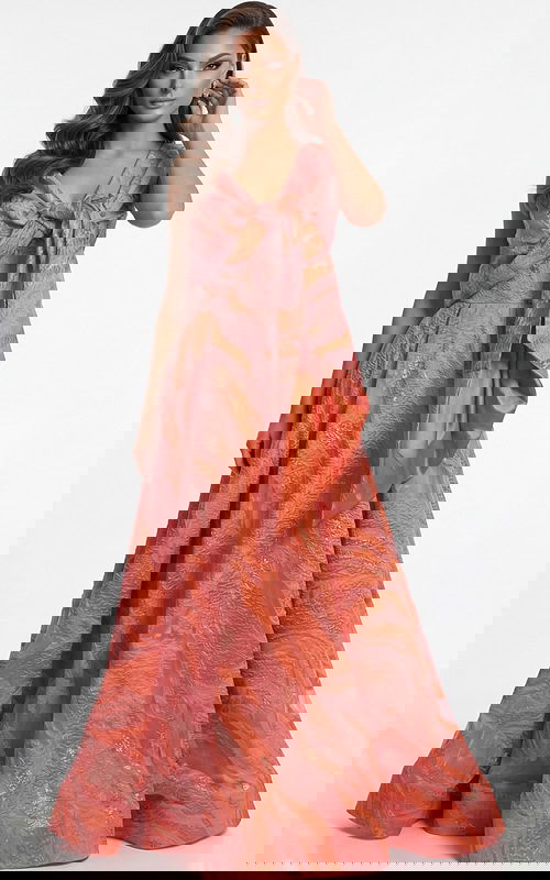 textured A line gown with defined waist and flowing structured skirt