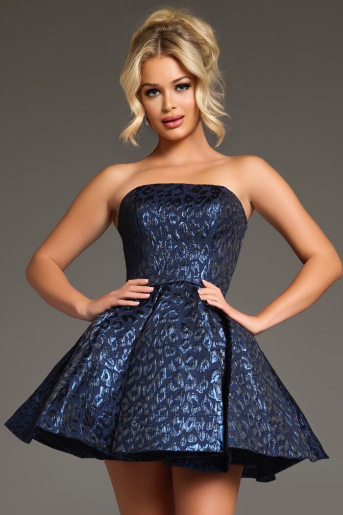 Model wearing Jovani 42135, front view, navy strapless short flared dress with animal print design.