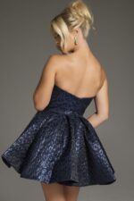 Model in Jovani 42135, back view, navy strapless dress highlighting a sleek, flared silhouette with animal print.