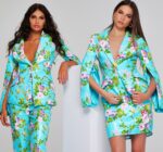 models wearing Jovani 42146 and 42147 multi-colored floral print ensembles.
