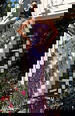 Strapless sequin gown with shimmering floral embellishments and sleek column silhouette