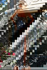 Strapless sequin gown with floral embellishments and shimmering finish